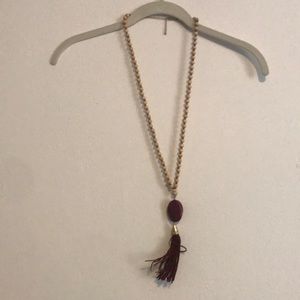 Wooden beaded necklace with pendant and tassel